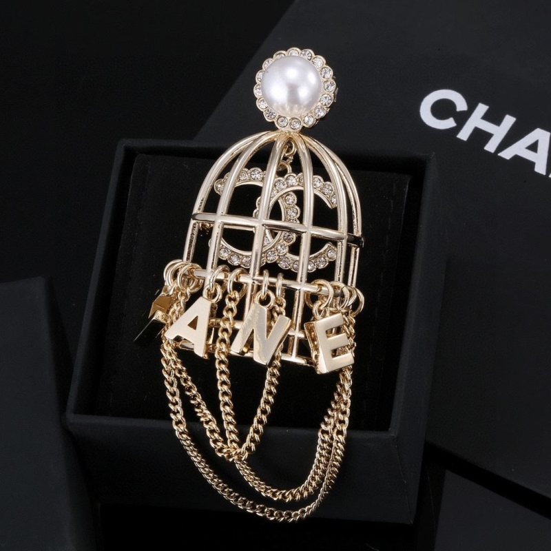 Ch*el brooches